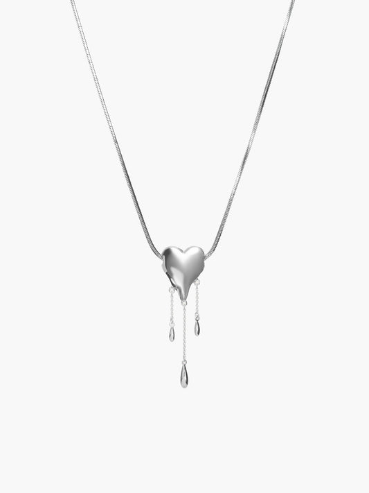 Venom’s Golden Drip Heart Necklace in Silver