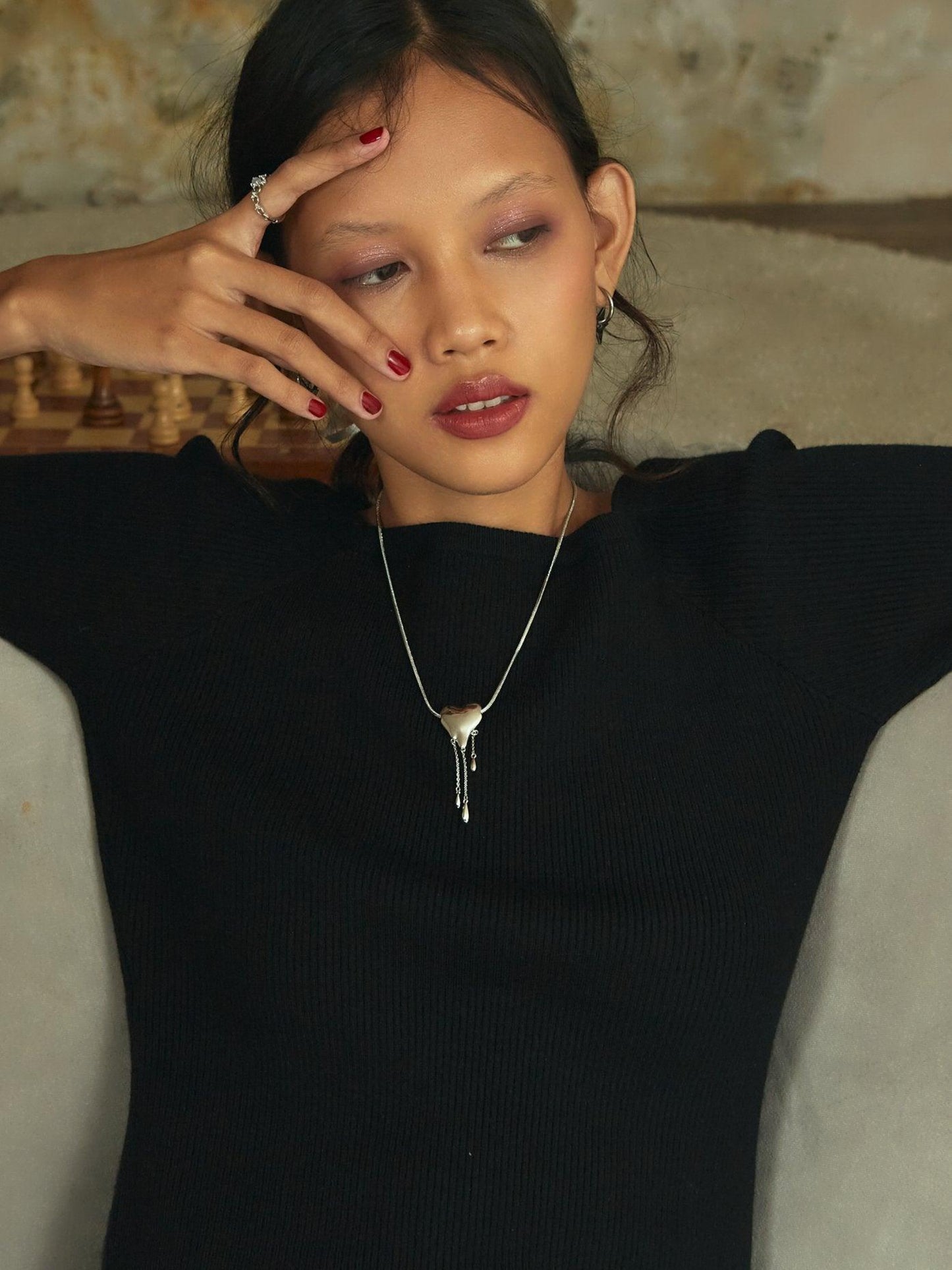 Venom’s Golden Drip Heart Necklace in Silver