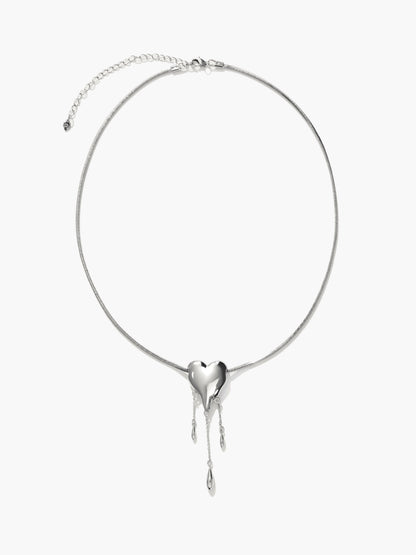 Venom’s Golden Drip Heart Necklace in Silver